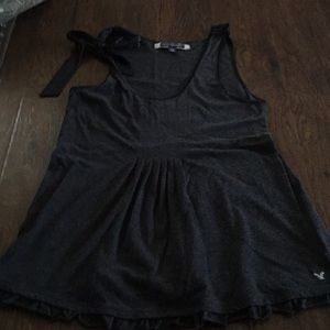 Dressy tank top with a bow on the shoulder